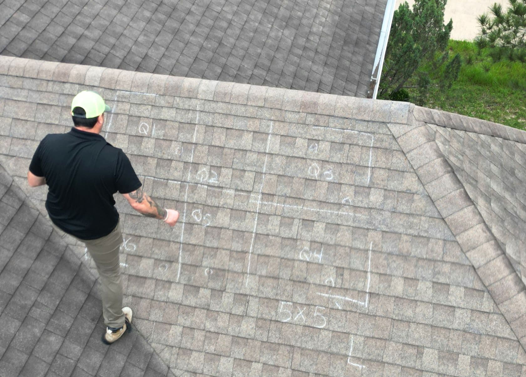Roof inspection with chalk markings identifying areas to review