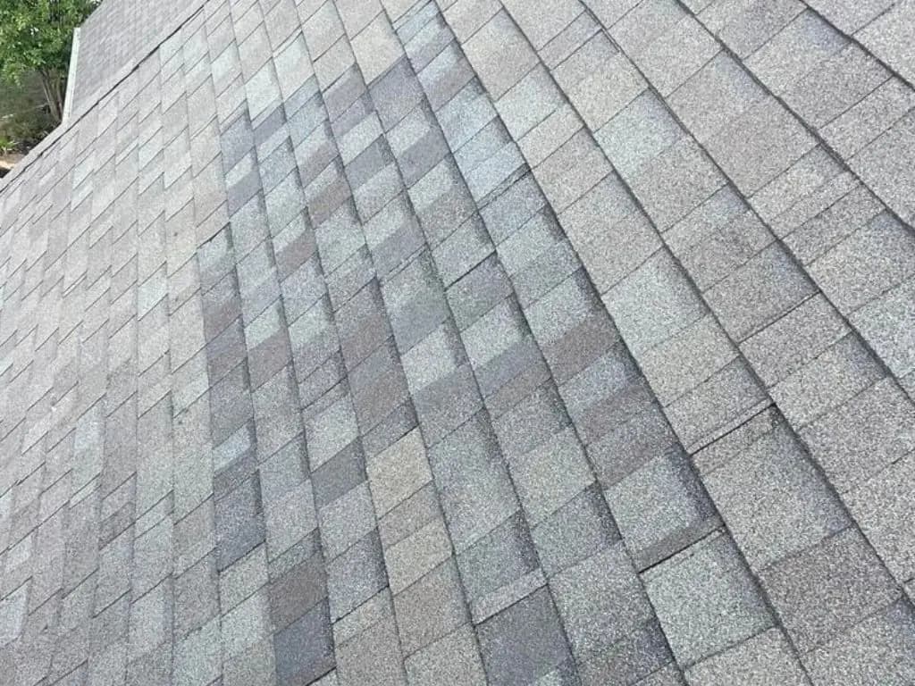 Shingle roof following a localized repair